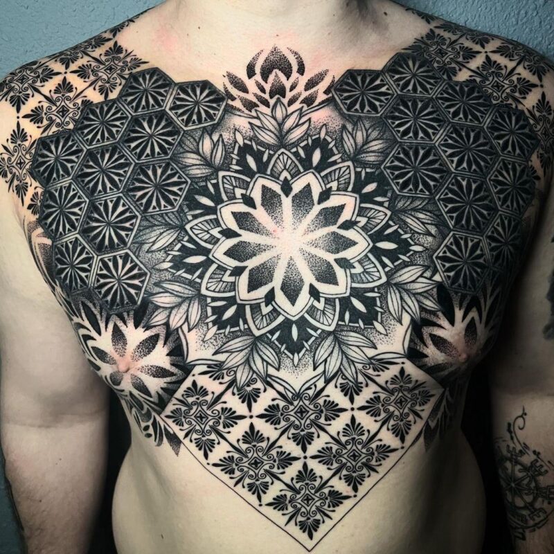 Geometric and Ornamental Chest Tattoos