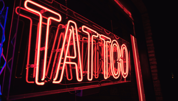 Neon light sign saying "Tattoo"