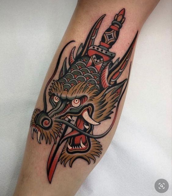 american traditional dragon tattoo