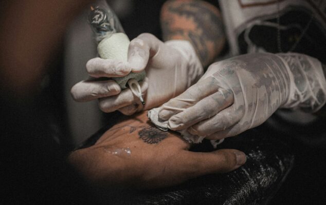 Small sunflower tattoo