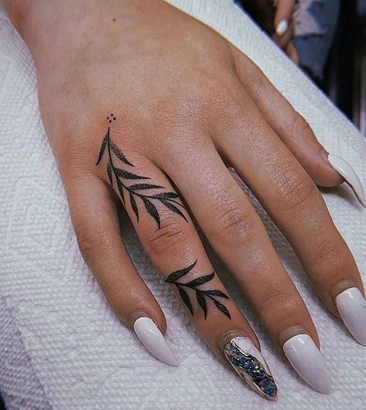 Hand and finger tattoos