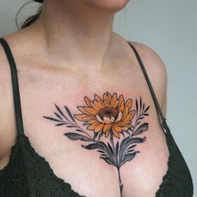 Tattoo between breast women